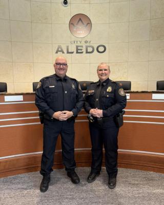 Chief Riddle with new officer